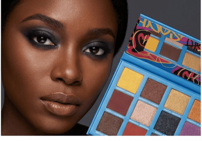 Black Woman using Black Radiance Eye shadow Palette