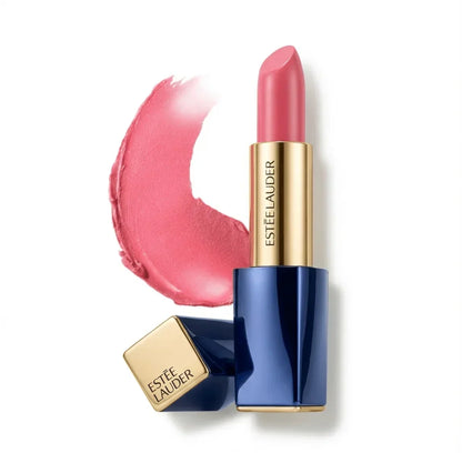 Pink lipstick with gold and blue case, creamy texture swatch on white background
