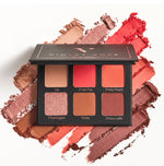 Violet Voss Coral Pop Edition mini eyeshadow palette with six shades swatched on white background