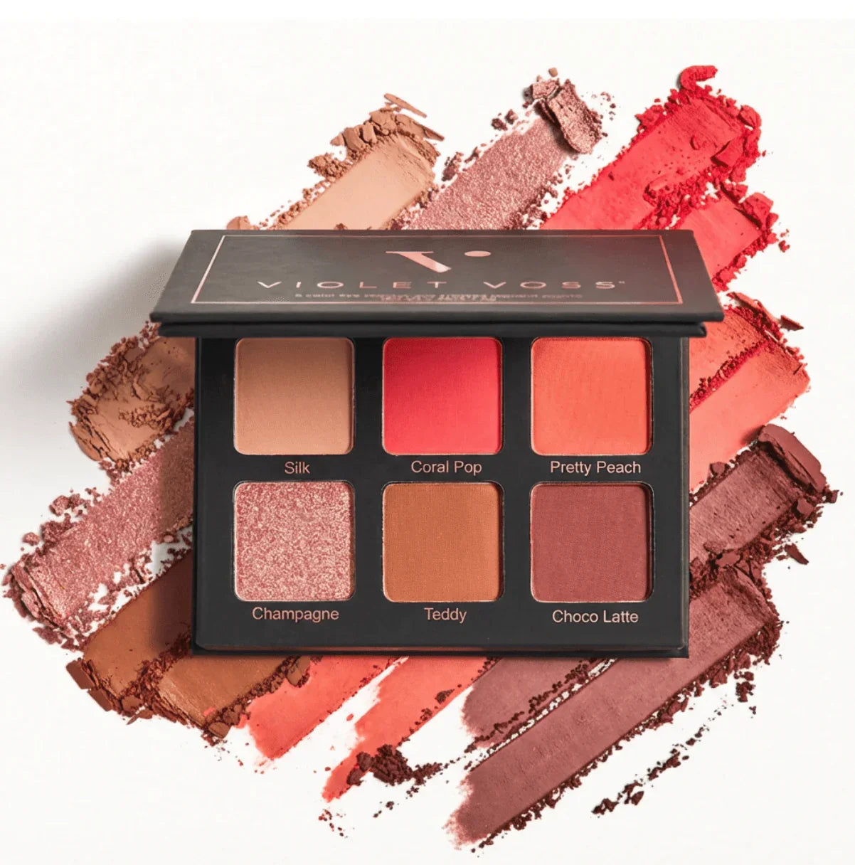 Violet Voss Coral Pop Edition mini eyeshadow palette with six shades swatched on white background